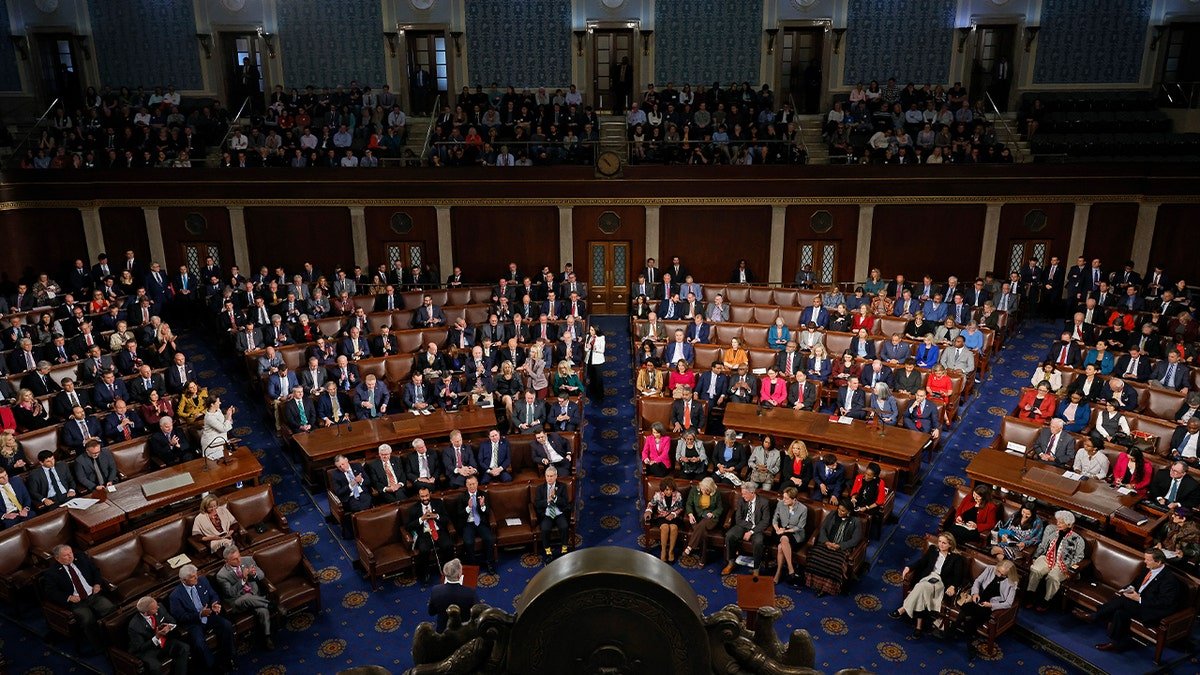 A house full of people in the seats