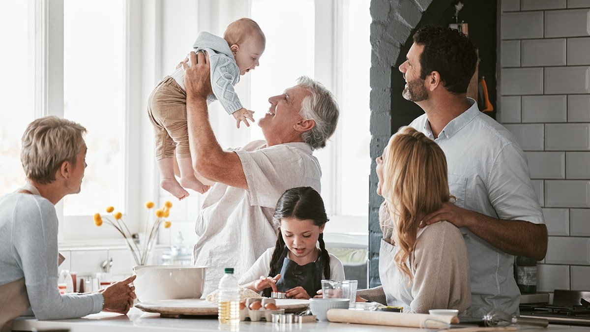 Family with children in the kitchen