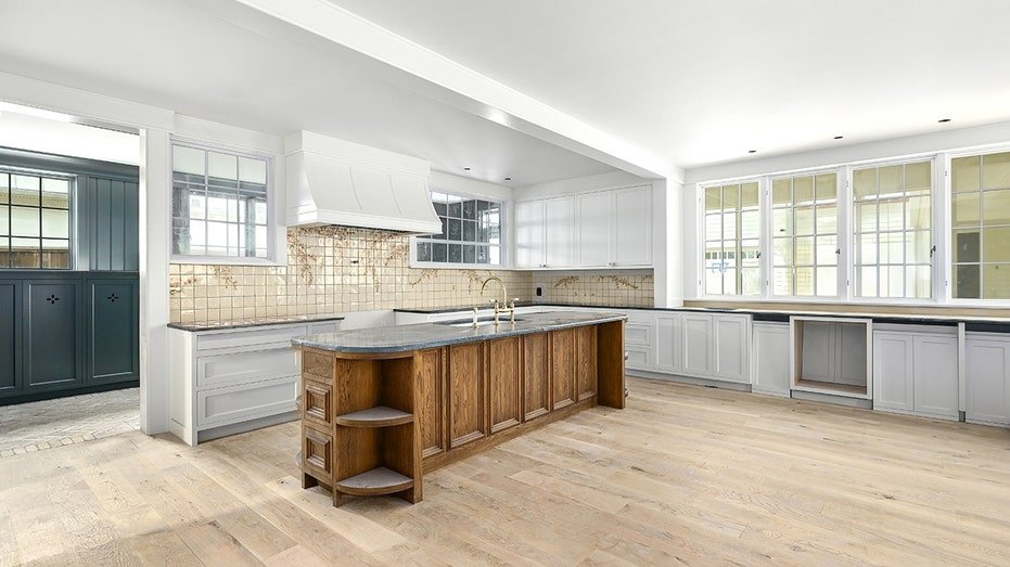 The kitchen features a central island.