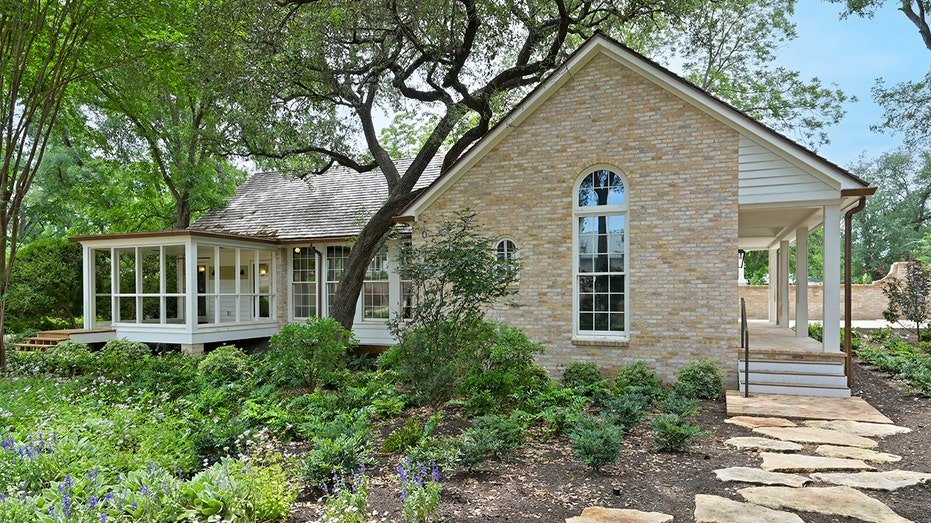 The stone road leads to the hospitality house in the property.