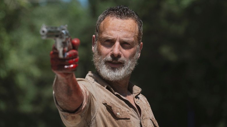 Andrew Lincoln in the role of Rick Grames carry his weapon in the dead walking episode what comes after