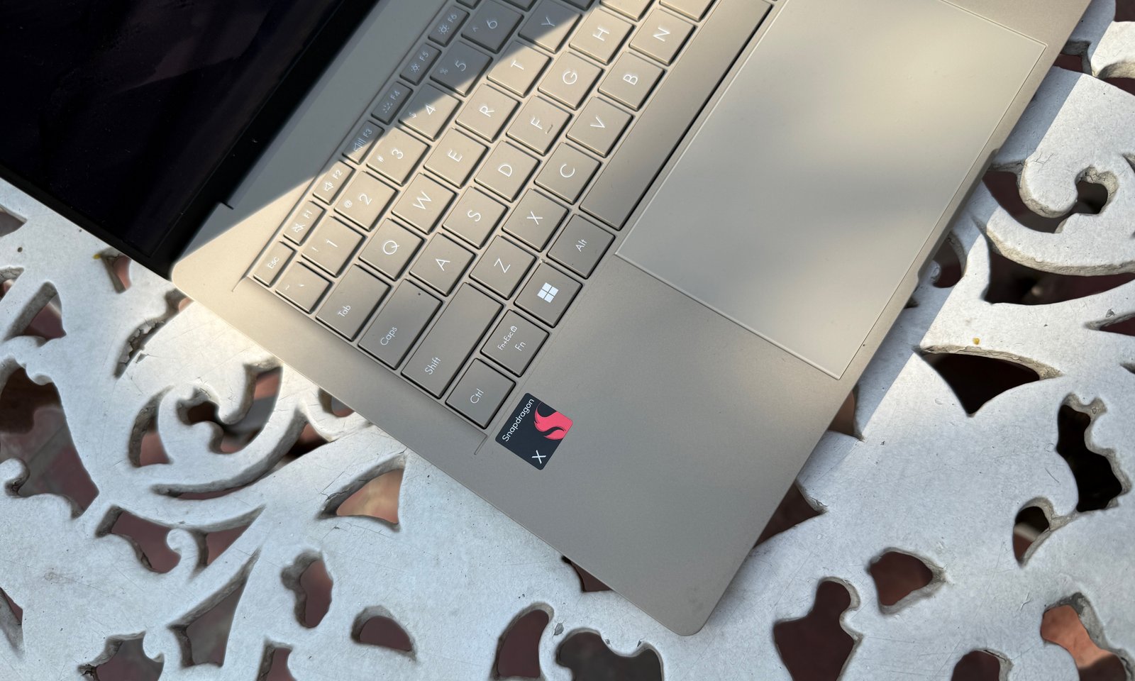 Snapdragon Label on the ASUS Zenbook A14 laptop.