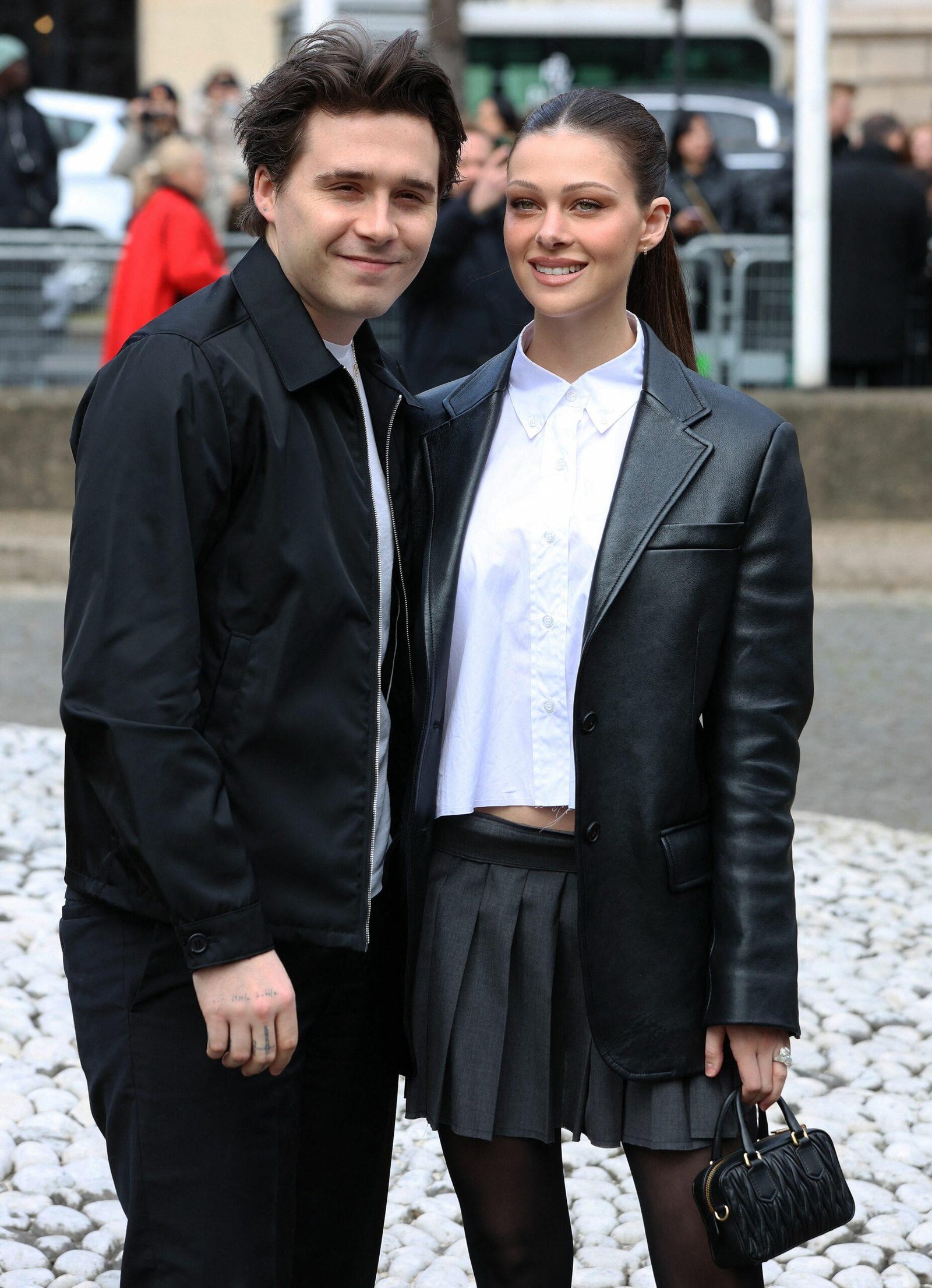 Brooklyn Beckham and Nikola Bilz attend Miu Miu Womenswear Fall Winter