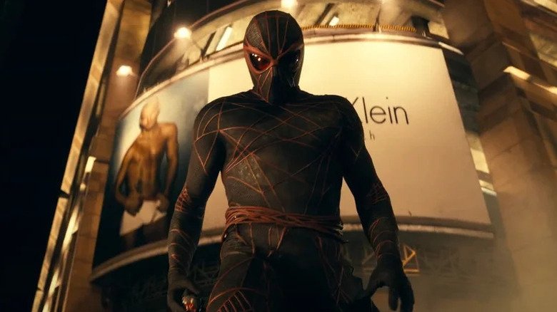 Taher Rahim in the role of Ezekiel Sims wears a costume in Madame Web
