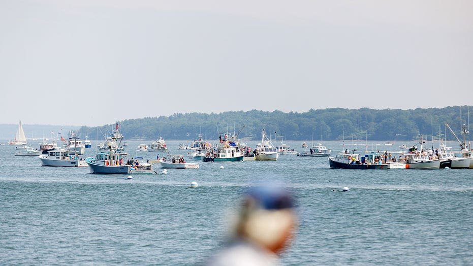 Portland, I - August 20: The boats gather in the Casco Bay for the lobster boat racing on Sunday, August 20, 2023.