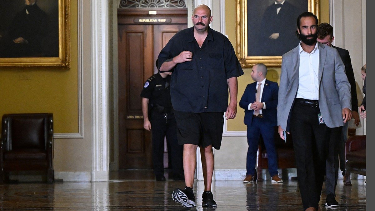 Fetterman walks in Capitol