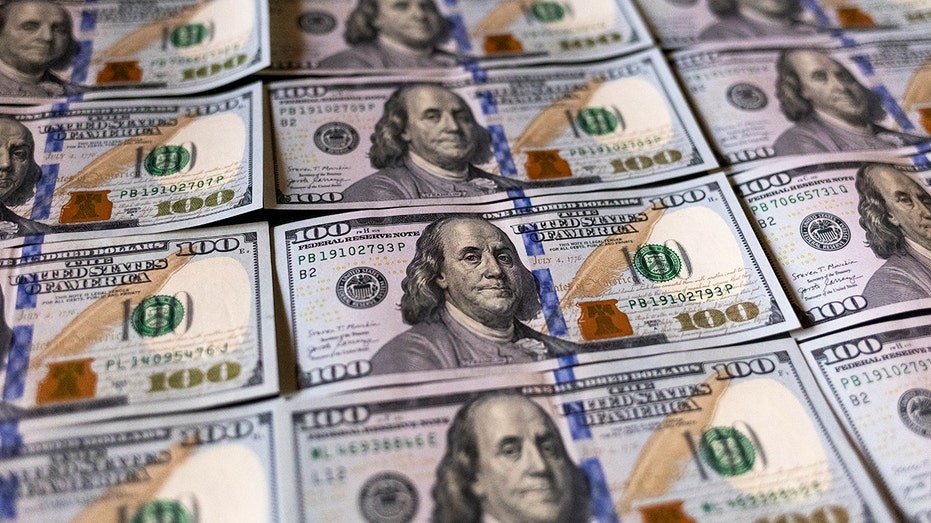 The United States hundreds of dollars on the table on the table