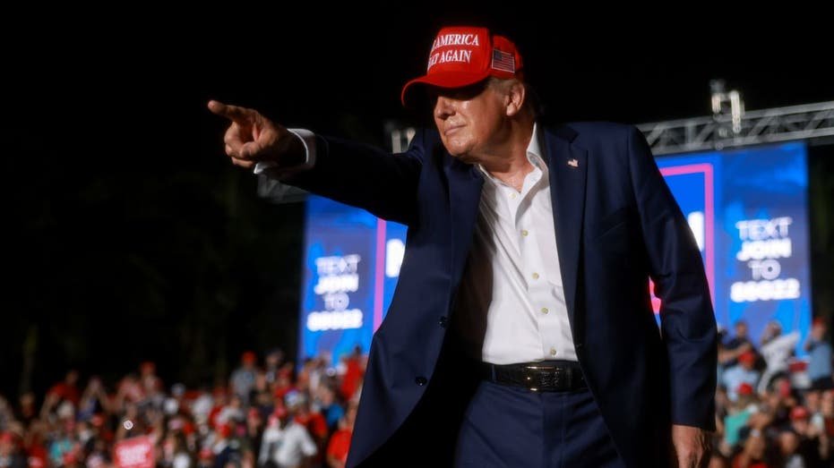 Trump points during the campaign gathering