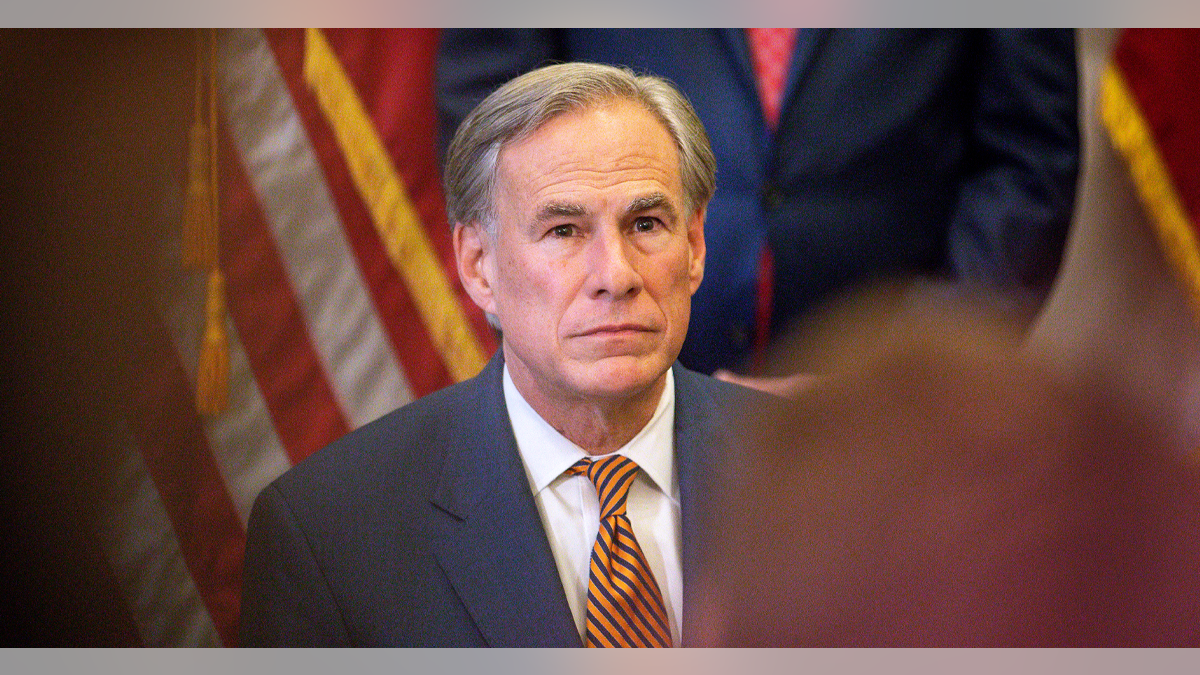 Greg Abbott attends the press conference in Austin
