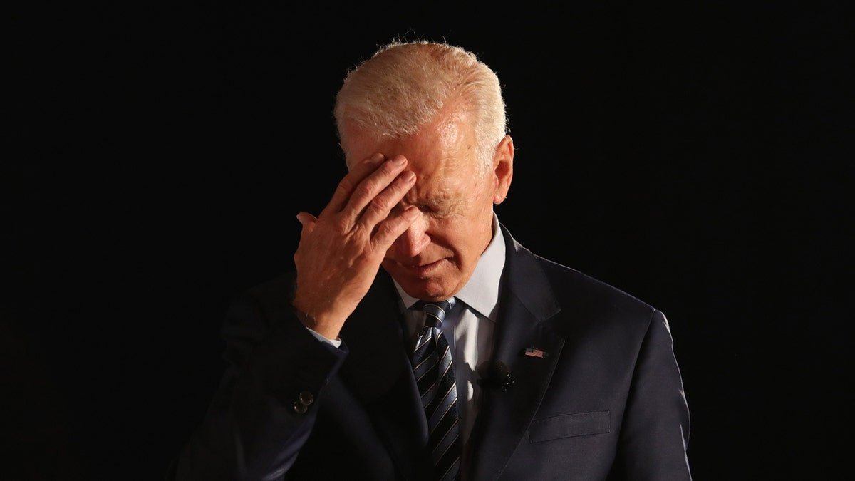 Joe Biden on a dark background