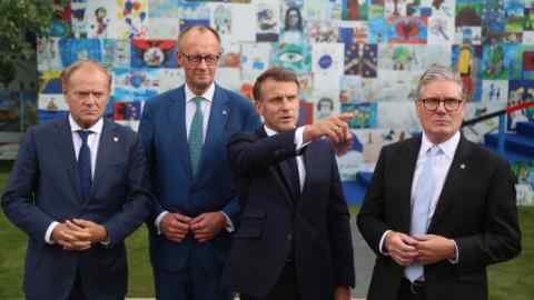 Donald Tusk, Friedrich Mirz, Emmanuel Macron and Mr. Kerr Starmer at the European Union summit in Tirana