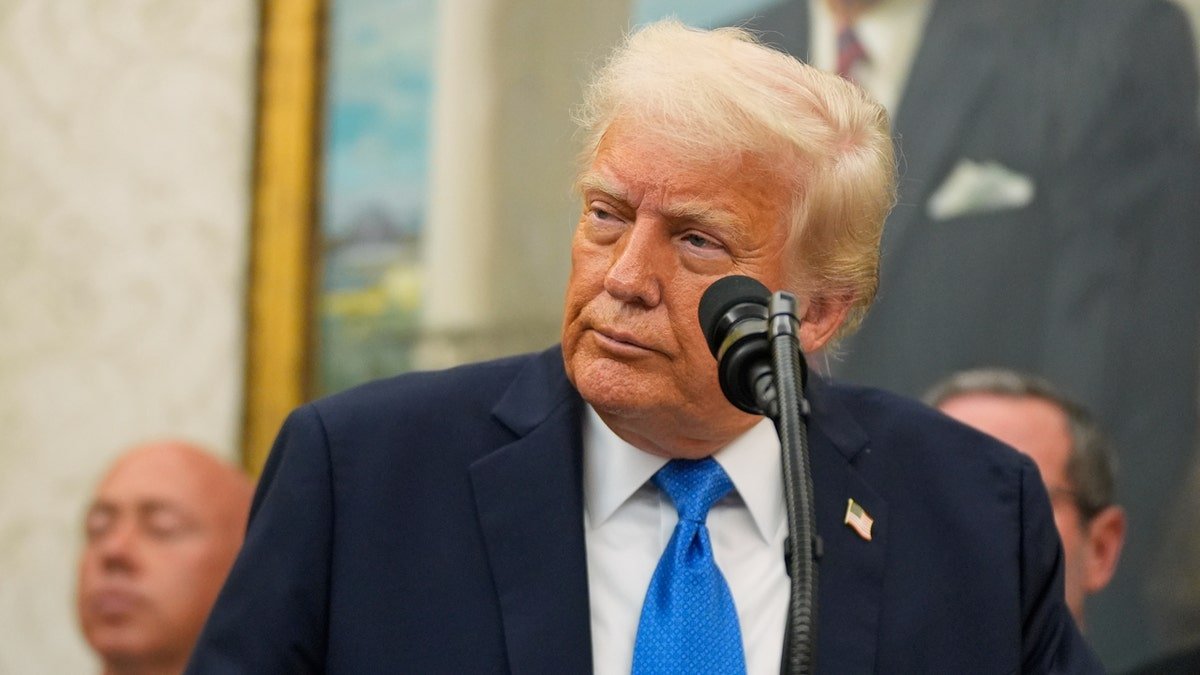 Donald Trump in a blue tie, a close shot
