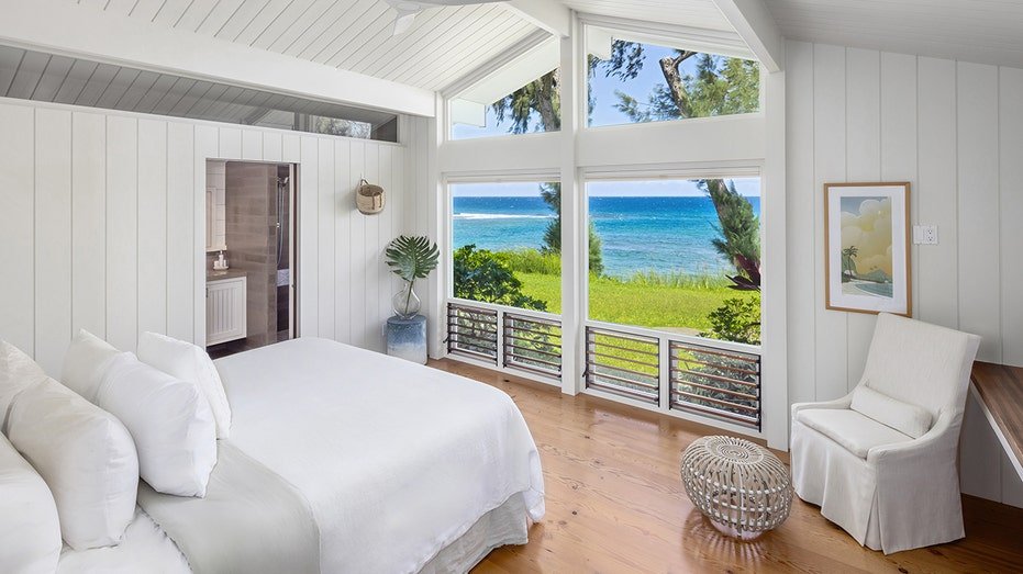 The guest's bedroom is also proud of the picturesque ocean views.