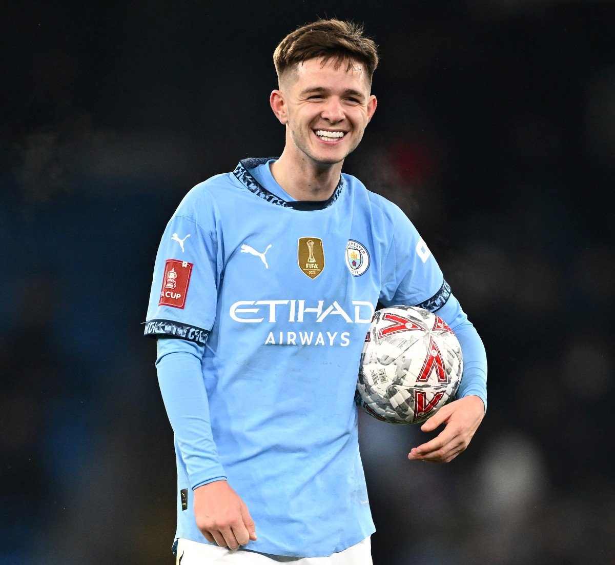 Man City James Macty with match ball