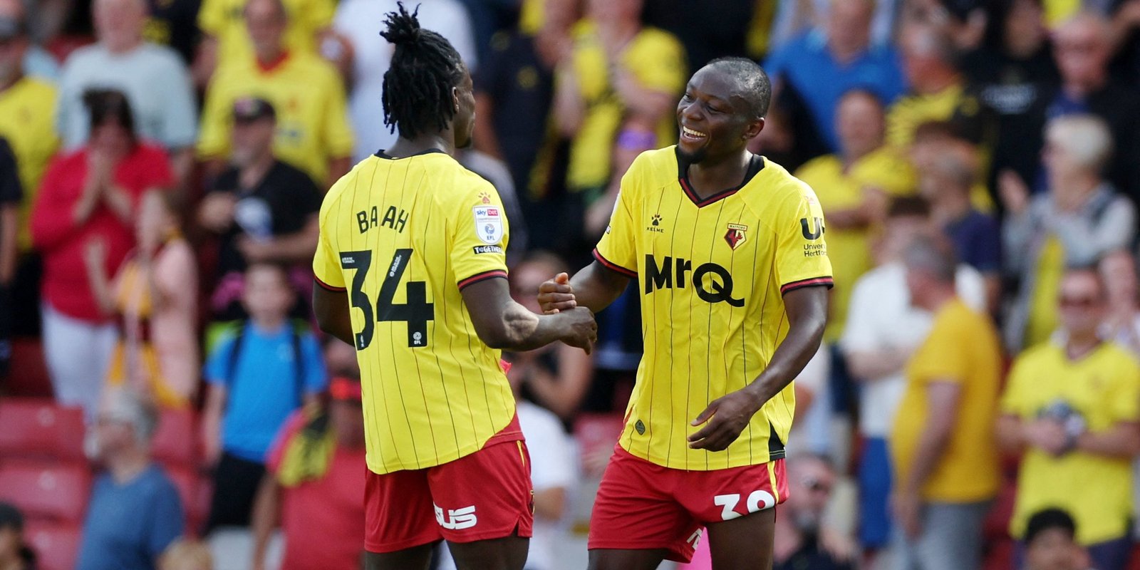 Kawado Bah and Ido Kimbe celebrate after the match 