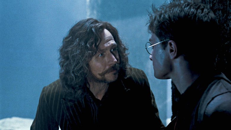 Sirius Black (Gary Oldman) holds his stick in Harry Potter and a prisoner of Azkaban