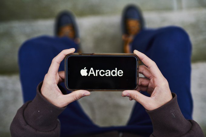 Apple Arcade Video Game Service Service is shown on iPhone