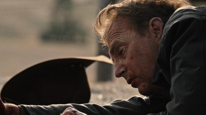 John Daton of Kevin Costner puts blood on the floor in Yellowston