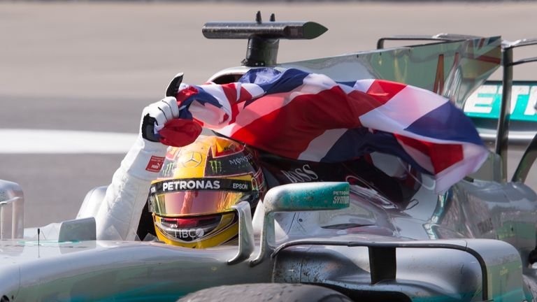 Mercedes Lewis Hamilton (44 years old), from Britain, is waving a flag after his victory in the Grand Prix of Automotive on Sunday, June 11, 2017, in Montreal.