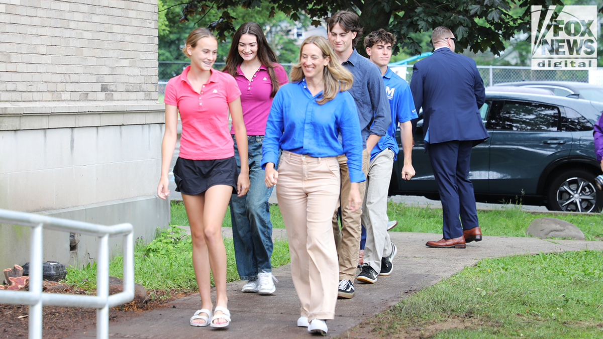 Micky Sherrill with her children