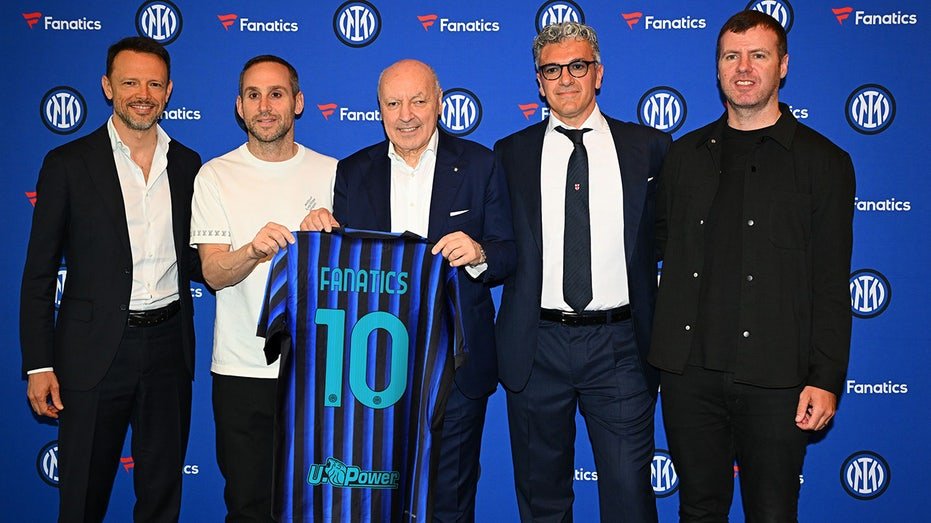 Michael Robin, Inter Milan CEO, Michael Robin is presented with Inter Milan Jersey