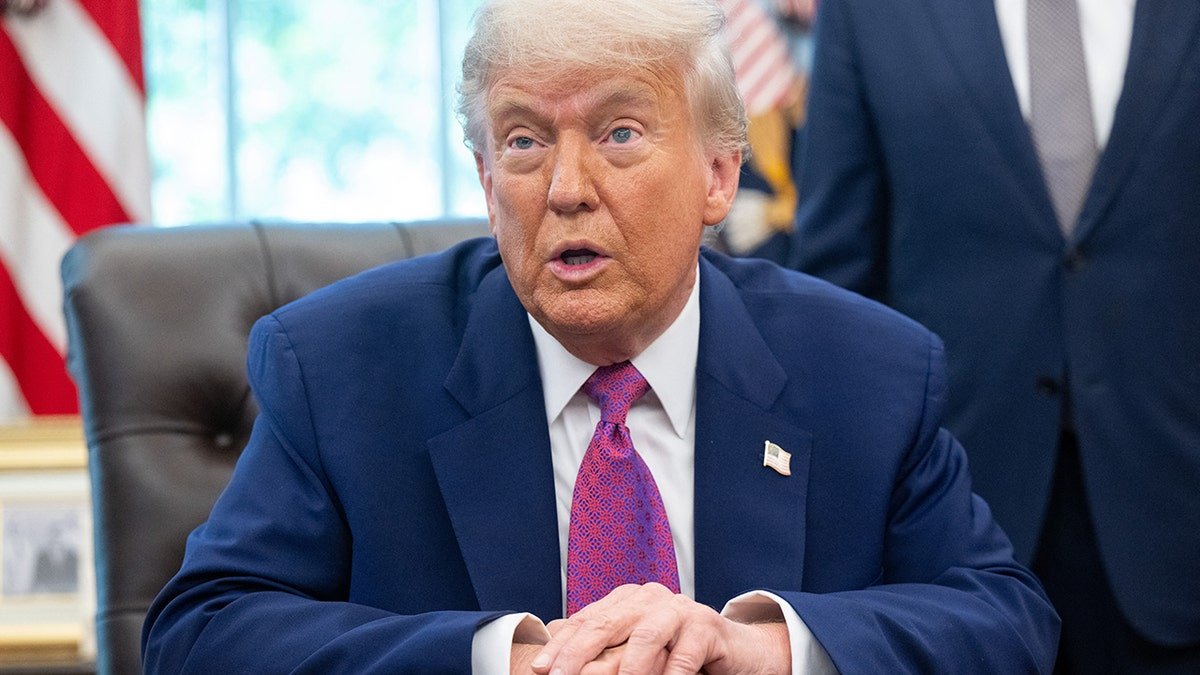 Trump is in an oval office in an office