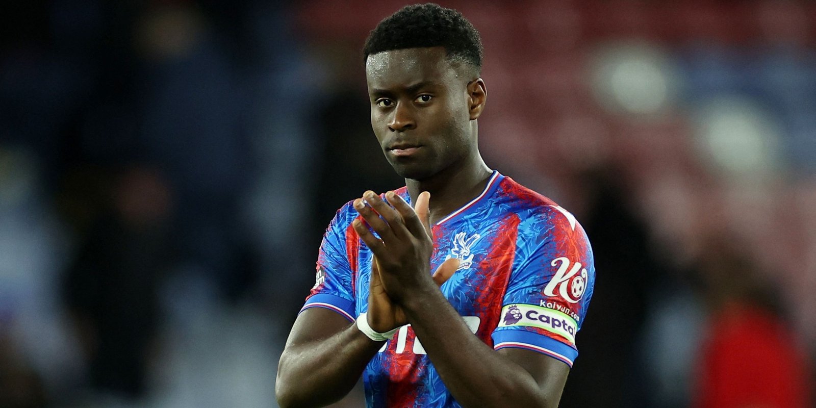 Mark Goyahi interacts from Crystal Palace after the match 