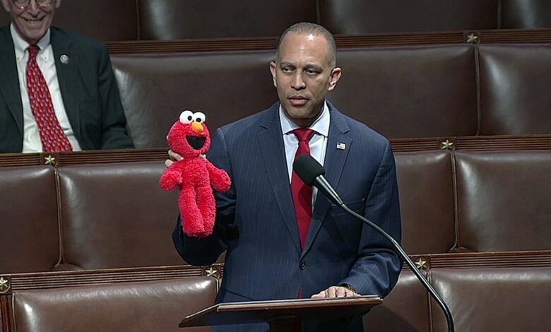 1749802864 Jeffries uses Elmo puppet to fight Republican 9 billion spending.jpg