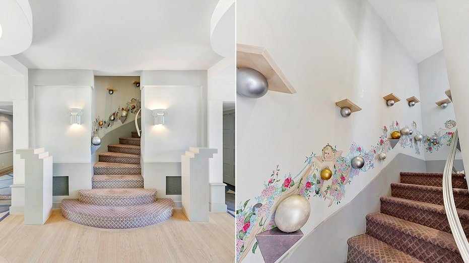 A curved drawer with complex designs along the walls leads to the upper level of the house.