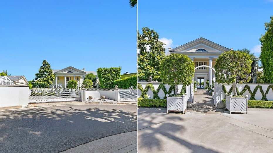 The house can be found behind a white gate, which also leads to motorcourt.