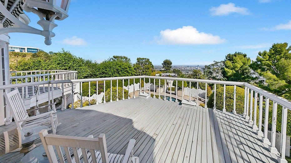 The house includes more than an external balcony.