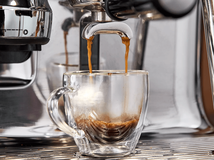 The image may have: a cup, drinks, coffee, a cup of coffee, and aspresso