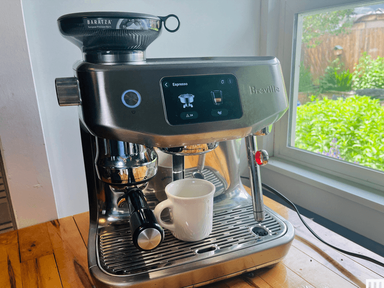 The image may contain: cup, device, device, electric device, blender, drinks, coffee and coffee
