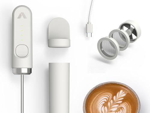The image may contain: cup, drinks, coffee, cup of coffee, tape, and electronics