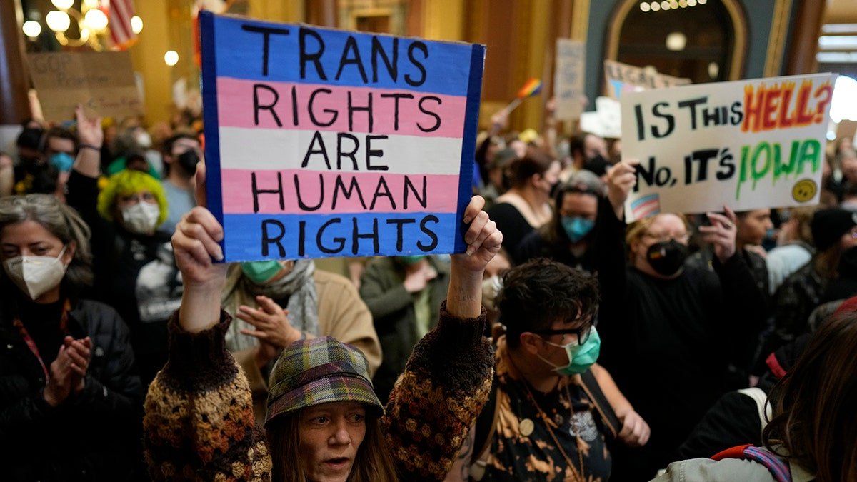 Protesters rights via signs with signs
