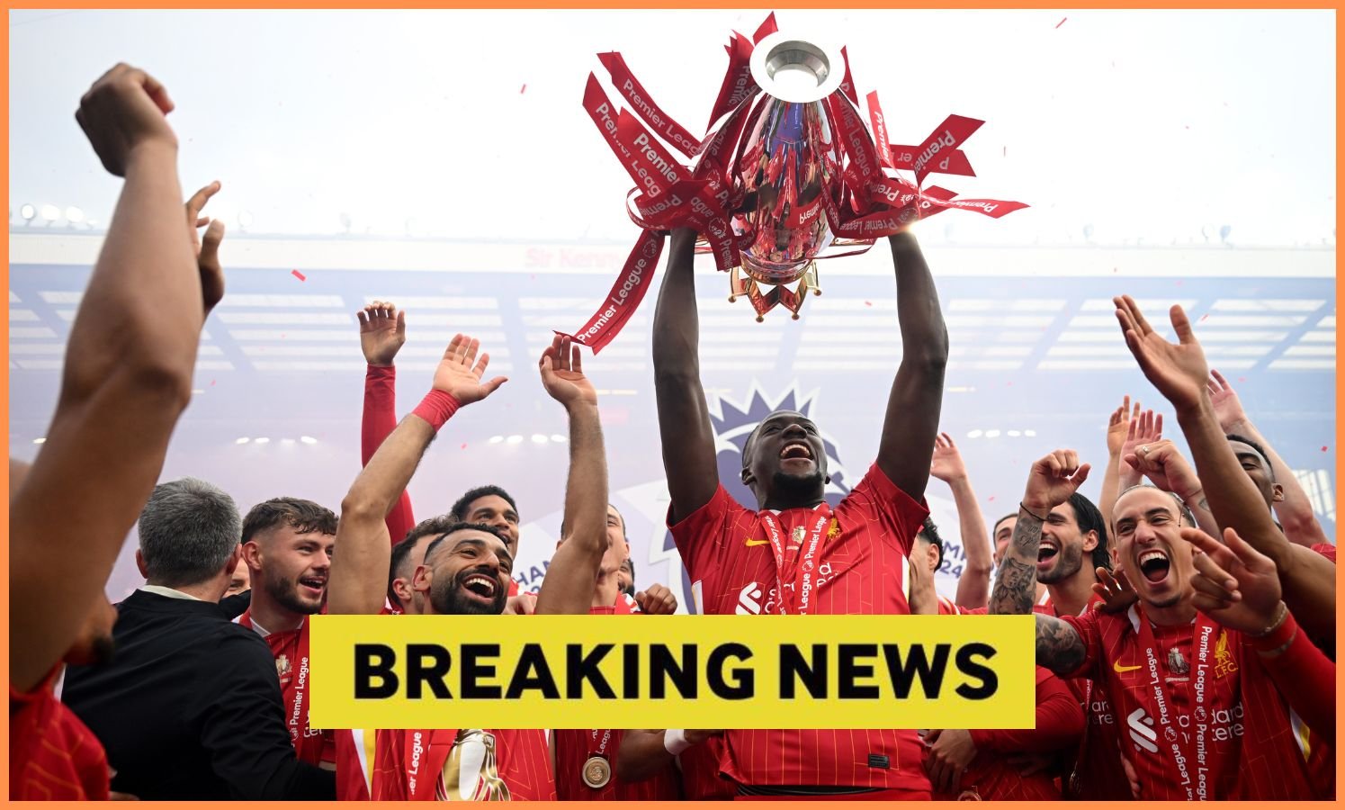 Ibrahim Konte raises the Premier League Cup with Liverpool