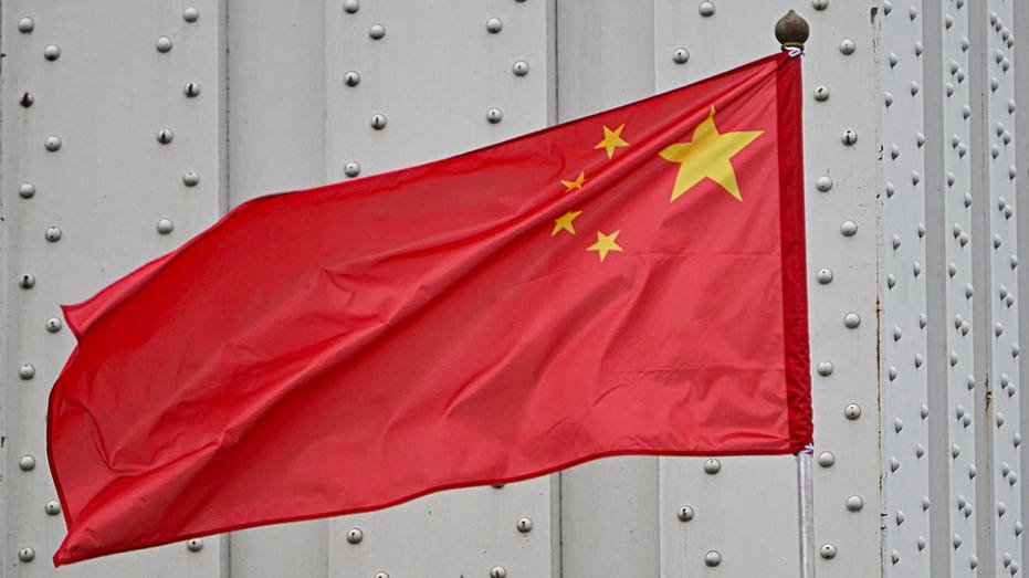 The Chinese national flag decorates the Erzsebel Bridge in Budapest, Hungary on May 8, 2024. Chinese President Xi Jinping pays an official three -day visit to Budapest starting from the evening of May 8, 2024.