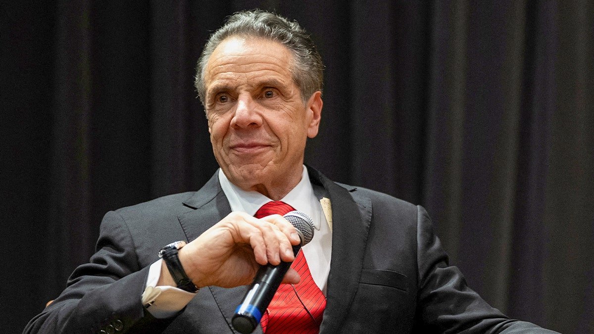 Cuomo Closeup shot, bearing the microphone