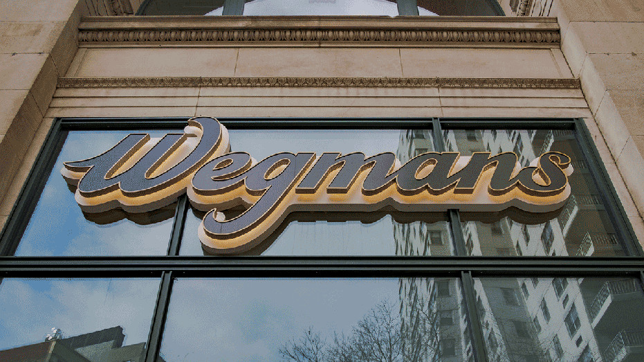 Wegmans signs the grocery store building