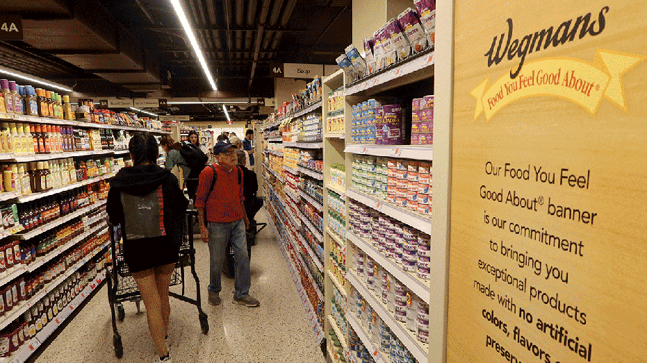 People shop at the Wegmans Astor Place