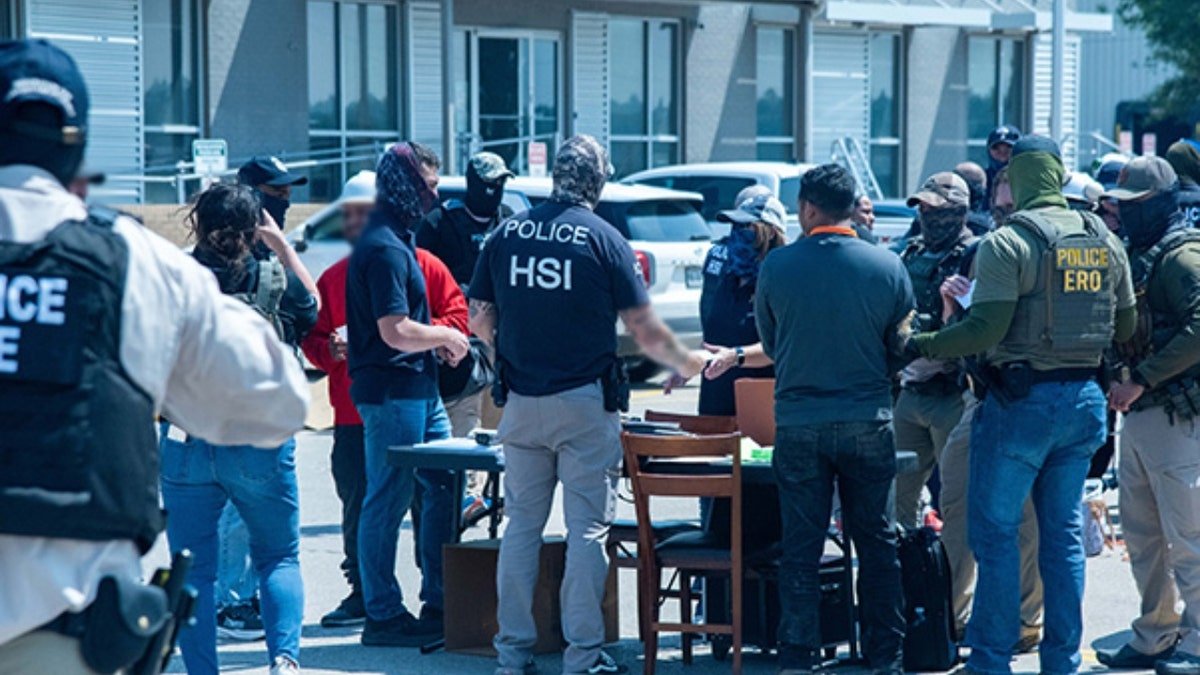 Ice agents outside the Omaha factory