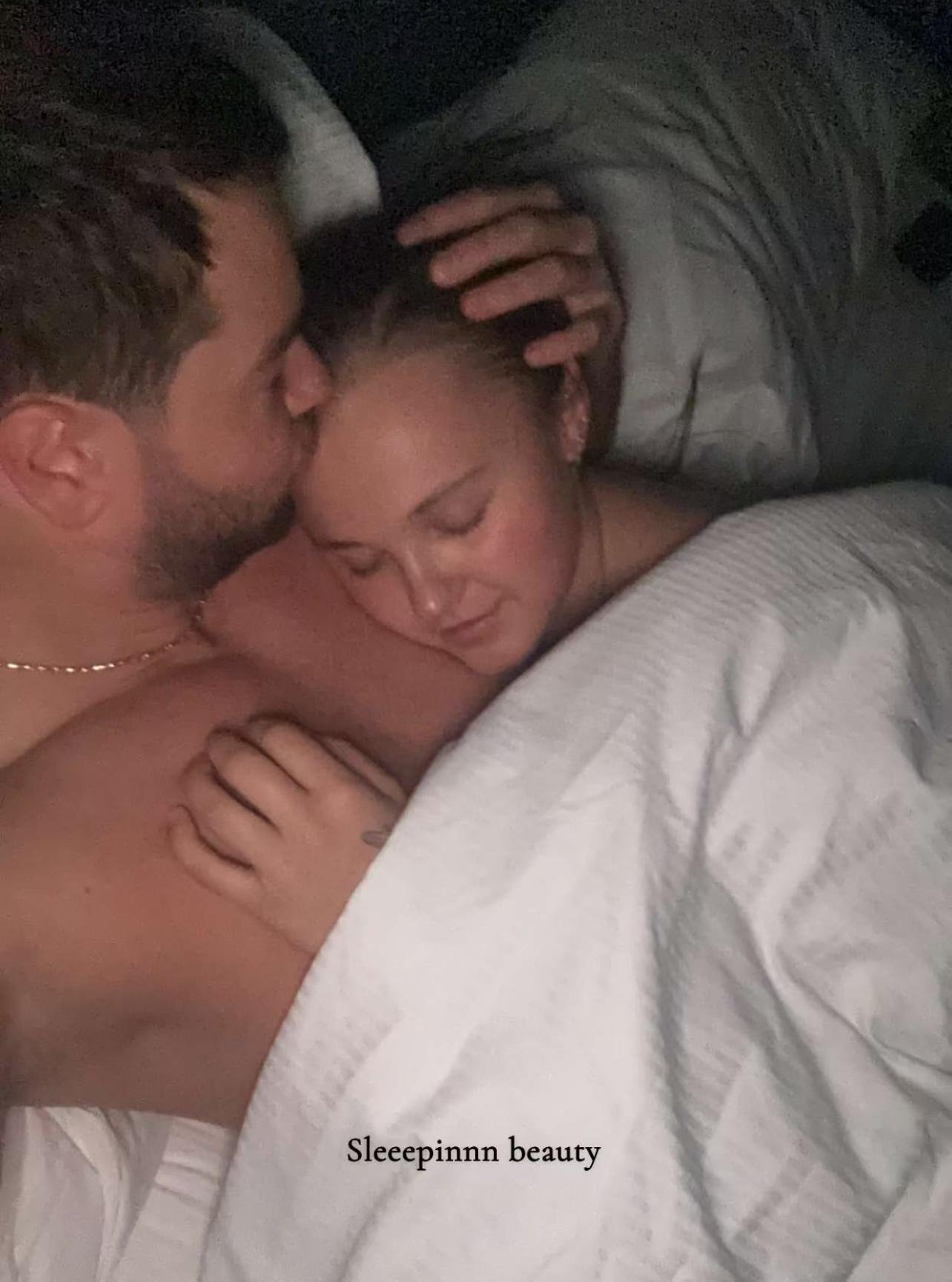 A picture of Chris Hughes embraces with Jojo Siwa