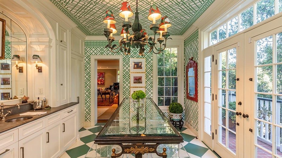 The music institute features green and white tiles as well as green hair design wallpaper.