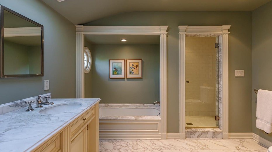 Two additional narrow bedrooms can be found on the top floor.
