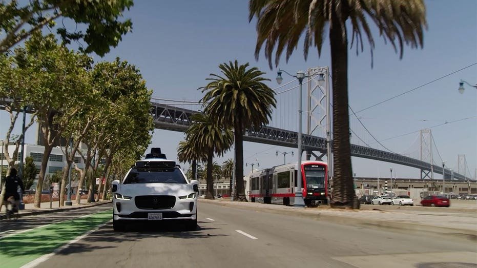 Waymo with San Fran Bridge