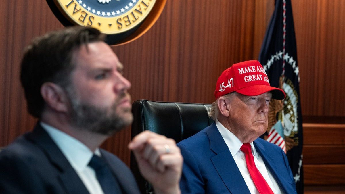 President Donald Trump wears the Maga and JD Vance House look at the situation room