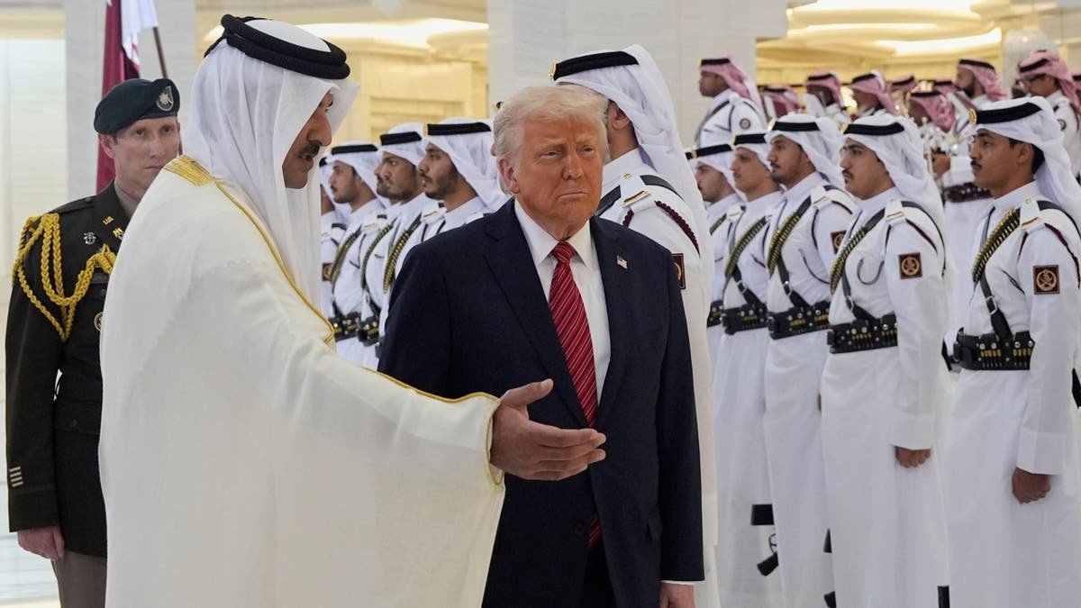 The Emir of Qatar, Sheikh Tarim bin Hamad Al Thani, President Donald Trump, during an official welcome ceremony in the Emir of Diwan in Doha, Qatar, on Wednesday, May 14, 2025.