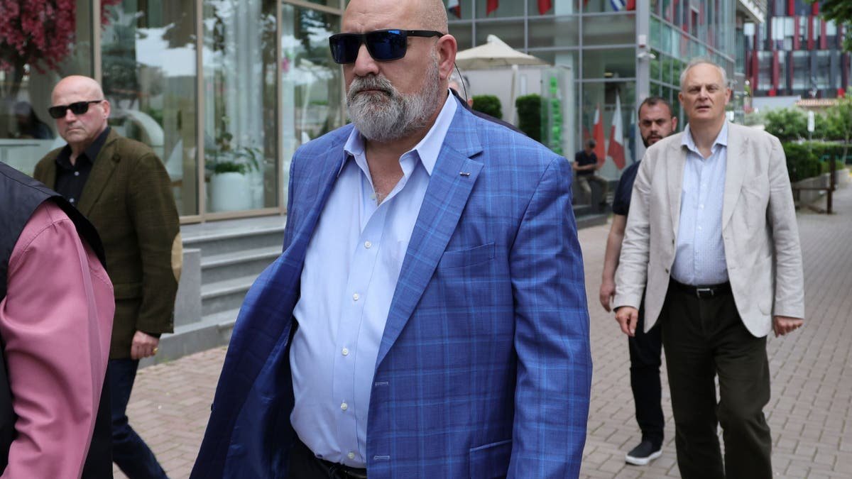 Here Chris Lakvita, the former Trump campaign adviser, appears in the Albanian capital before Sunday's elections against Socialist Prime Minister Ida Rama in Tirana, Albania, on May 9, 2025.