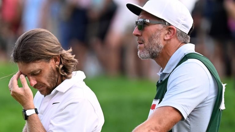Tommy Flevod interacts from England, while Kejan Bradley is preparing to win during the last round of the Traverels Golf Golf championships at TPC River Highlands, Sunday, 22 June 2025, in Cromwell, Conn. (AP Photo/Jessica Hill)
