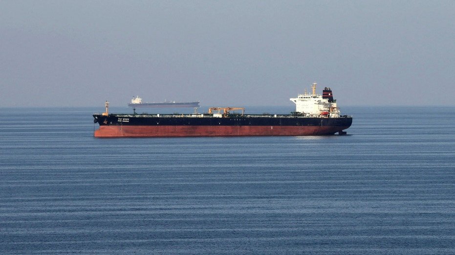 Oil tankers pass through the Strait of Hermoz, December 21, 2018.
